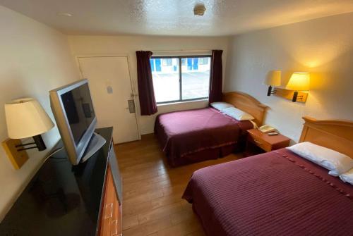 Imagen de la habitación del Hotel Travelodge By Wyndham Grand Rapids North. Foto 3