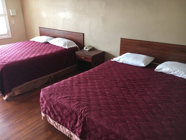 Imagen de la habitación del Hotel Travelodge By Wyndham Harbor City. Foto 6