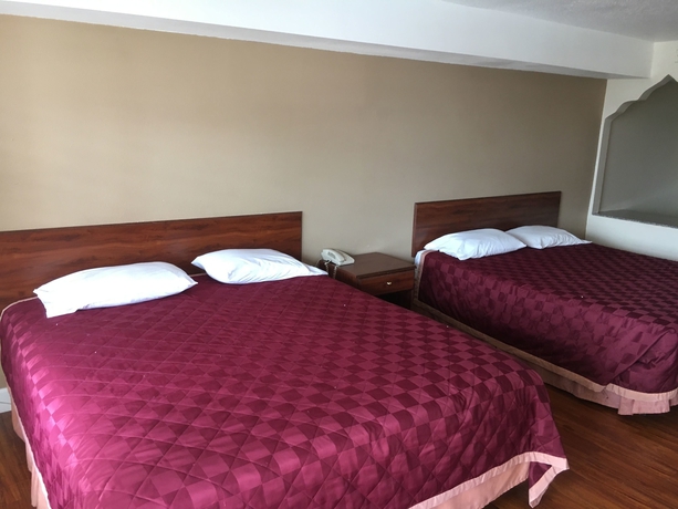 Imagen de la habitación del Hotel Travelodge By Wyndham Harbor City. Foto 7