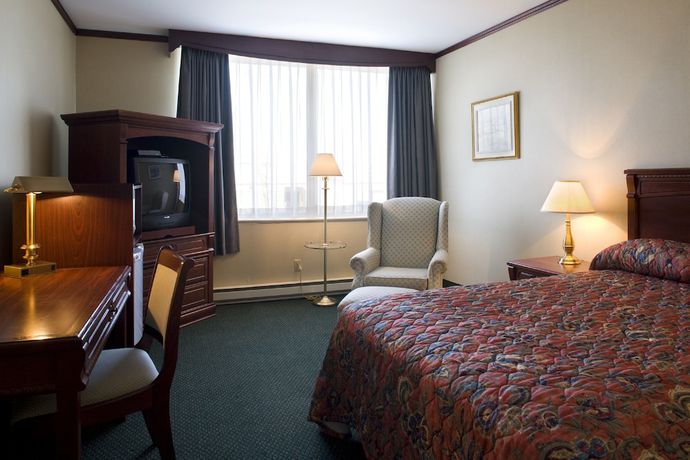 Imagen de la habitación del Hotel Travelodge By Wyndham Montreal Airport. Foto 11