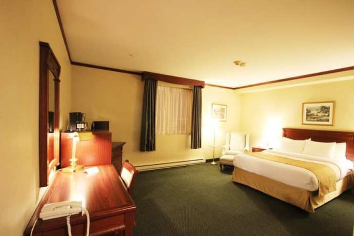 Imagen de la habitación del Hotel Travelodge By Wyndham Montreal Airport. Foto 12