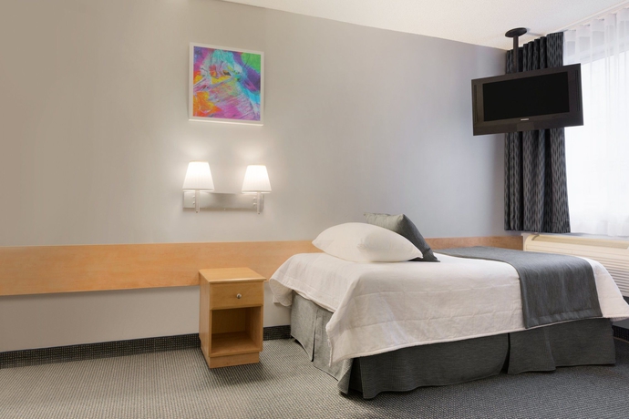 Imagen de la habitación del Hotel Travelodge By Wyndham Montreal Centre. Foto 8