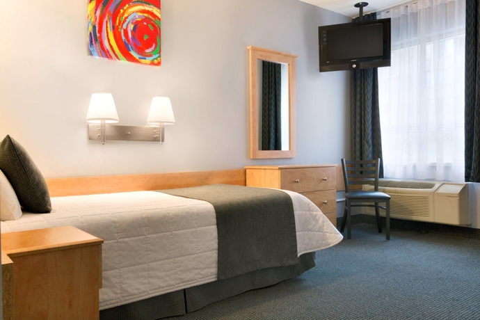 Imagen de la habitación del Hotel Travelodge By Wyndham Montreal Centre. Foto 9