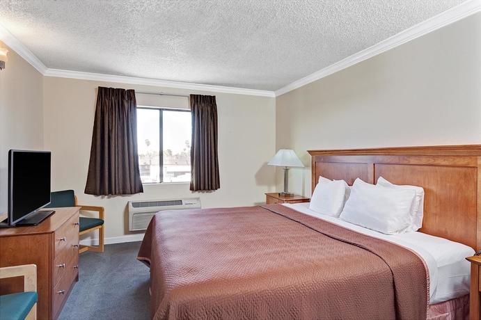 Imagen de la habitación del Hotel Travelodge By Wyndham Pasadena Central. Foto 11