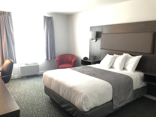 Imagen de la habitación del Hotel Travelodge By Wyndham Rigaud. Foto 8