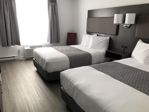 Imagen de la habitación del Hotel Travelodge By Wyndham Rigaud. Foto 9