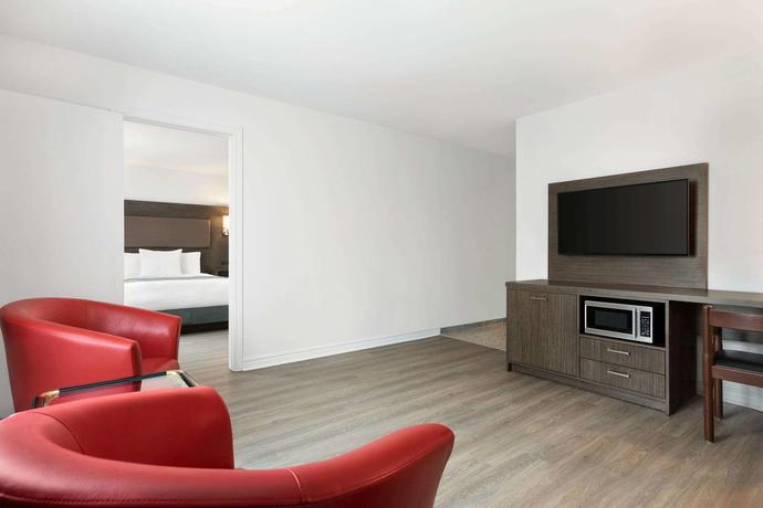 Imagen de la habitación del Hotel Travelodge By Wyndham Rigaud. Foto 11