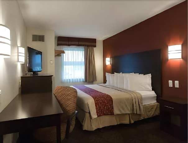 Imagen de la habitación del Hotel Travelodge By Wyndham Romulus Detroit Airport. Foto 9