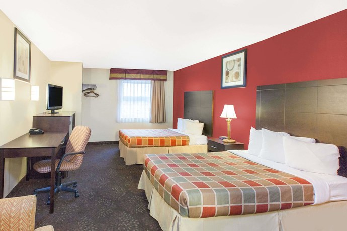 Imagen de la habitación del Hotel Travelodge By Wyndham Romulus Detroit Airport. Foto 11