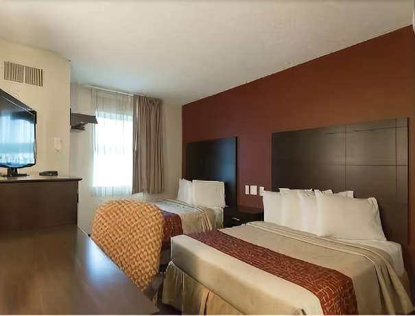 Imagen de la habitación del Hotel Travelodge By Wyndham Romulus Detroit Airport. Foto 16