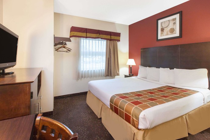 Imagen de la habitación del Hotel Travelodge By Wyndham Romulus Detroit Airport. Foto 17