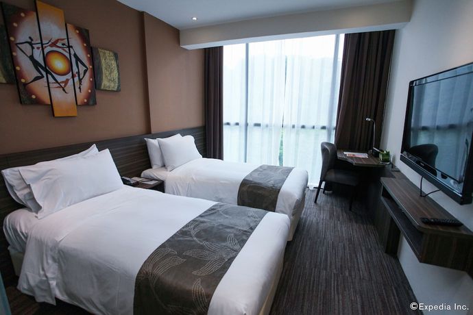 Imagen de la habitación del Hotel Travelodge Harbourfront. Foto 11