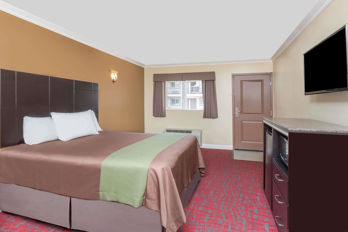 Imagen de la habitación del Hotel Travelodge Inn and Suites By Wyndham Bell Los Angeles Area. Foto 4