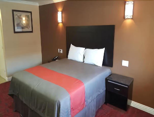 Imagen de la habitación del Hotel Travelodge Inn and Suites By Wyndham Bell Los Angeles Area. Foto 12