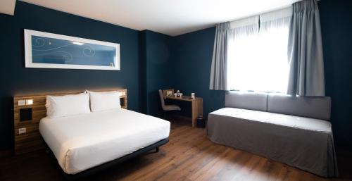 Imagen de la habitación del Hotel Travelodge Madrid Metropolitano. Foto 5