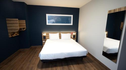 Imagen de la habitación del Hotel Travelodge Madrid Metropolitano. Foto 6