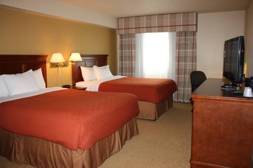 Imagen de la habitación del Hotel Travelodge Suites by Wyndham Regina / Eastgate Bay. Foto 7