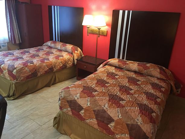 Imagen de la habitación del Hotel Travelodge by Wyndham Bay Shore Long Island. Foto 12
