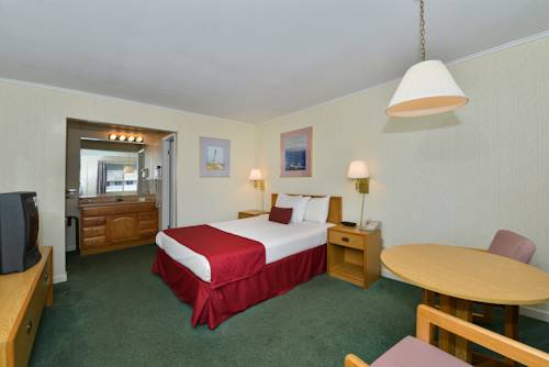 Imagen de la habitación del Hotel Travelodge by Wyndham Mackinaw City. Foto 14