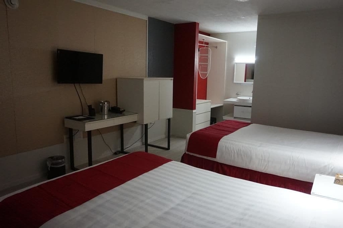 Imagen de la habitación del Hotel Travelodge by Wyndham Orlando / Heart of International Drive. Foto 11