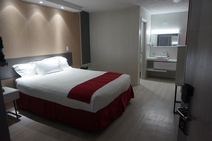 Imagen de la habitación del Hotel Travelodge by Wyndham Orlando / Heart of International Drive. Foto 12