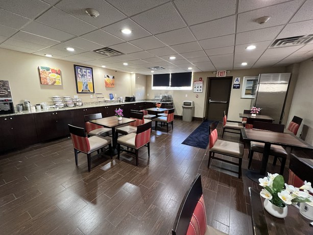 Imagen de la habitación del Hotel Travelodge by Wyndham Ozone Park. Foto 16