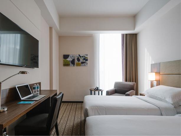 Imagen de la habitación del Hotel Traveltine. Foto 6