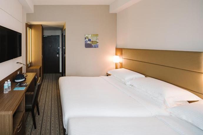 Imagen de la habitación del Hotel Traveltine. Foto 8