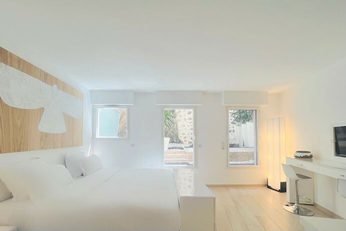 Imagen de la habitación del Hotel Traverse des Artistes. Foto 13