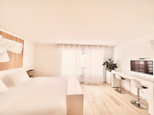 Imagen de la habitación del Hotel Traverse des Artistes. Foto 16