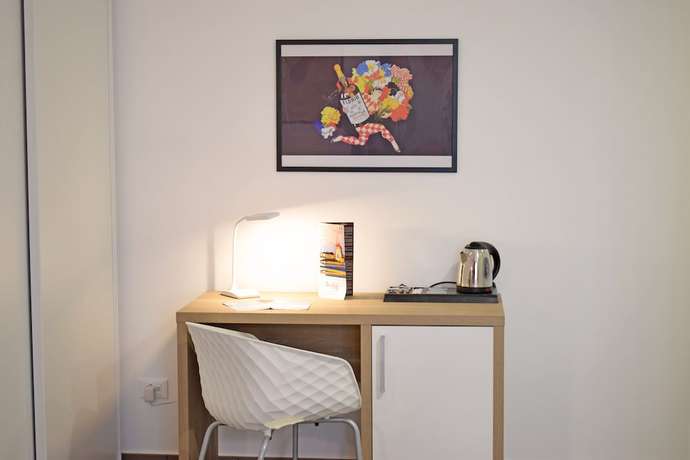 Imagen de la habitación del Hotel Travini Residence. Foto 6