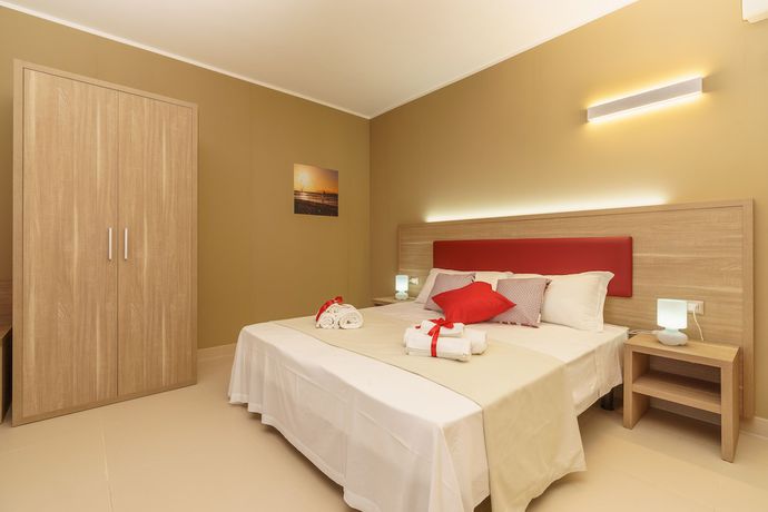 Imagen de la habitación del Hotel Travini Residence. Foto 8