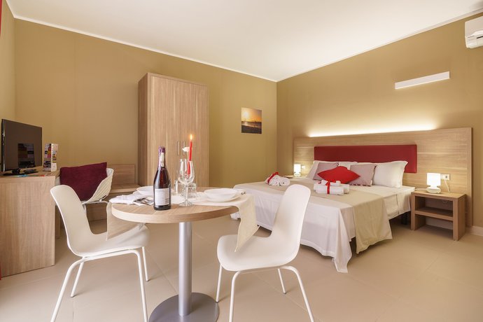 Imagen de la habitación del Hotel Travini Residence. Foto 9