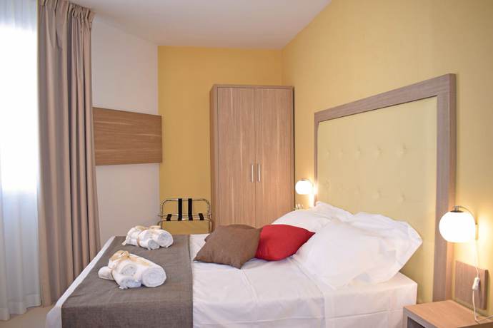 Imagen de la habitación del Hotel Travini Residence. Foto 10