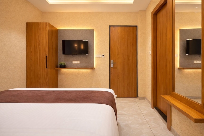 Imagen de la habitación del Hotel Travinities Premier, Ujjain. Foto 3
