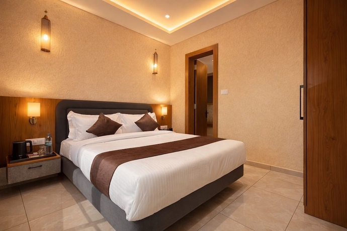 Imagen de la habitación del Hotel Travinities Premier, Ujjain. Foto 6