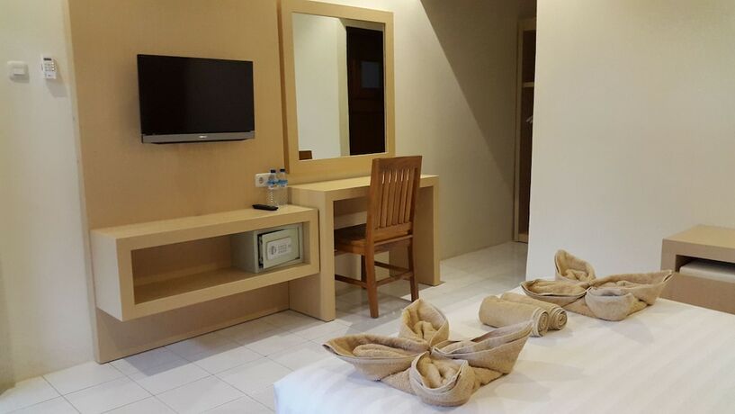 Imagen de la habitación del Hotel Trawangan Cottages. Foto 24