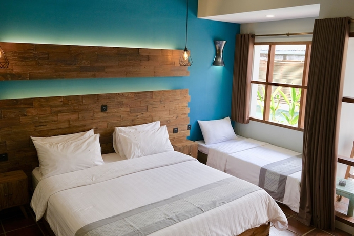 Imagen de la habitación del Hotel Trawangan Dive. Foto 9