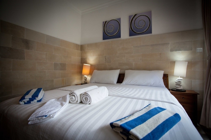 Imagen de la habitación del Hotel Trawangan Dive. Foto 10