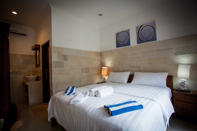 Imagen de la habitación del Hotel Trawangan Dive. Foto 11