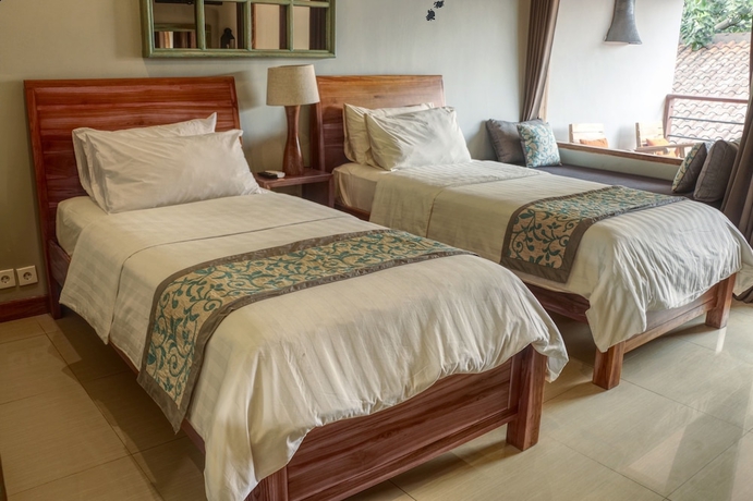 Imagen de la habitación del Hotel Trawangan Dive. Foto 13