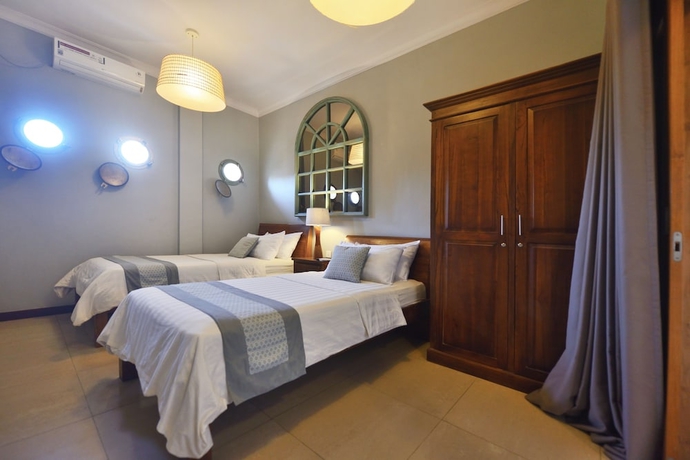 Imagen de la habitación del Hotel Trawangan Dive. Foto 15