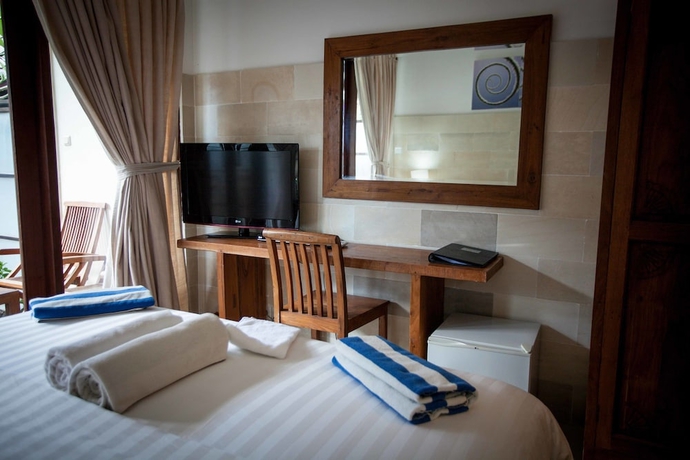 Imagen de la habitación del Hotel Trawangan Dive. Foto 17