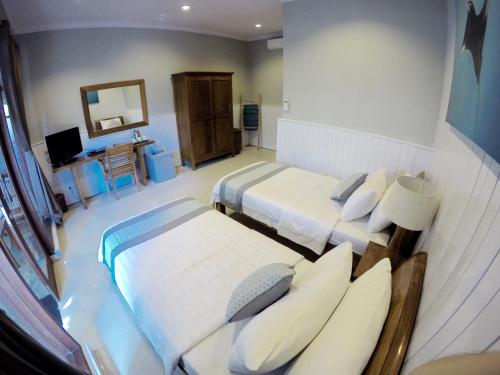 Imagen de la habitación del Hotel Trawangan Dive Resort. Foto 10