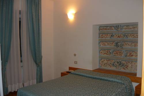 Imagen de la habitación del Hotel Tre Ceri. Foto 10