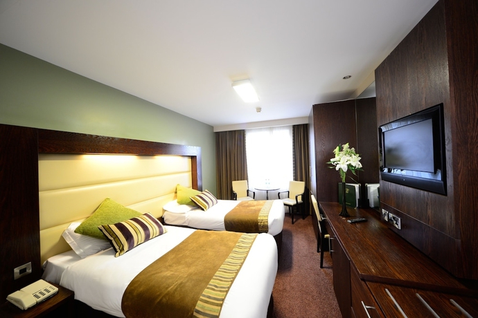 Imagen de la habitación del Hotel Treacy's. Foto 15
