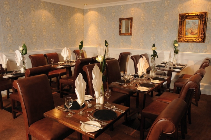 Imagen del bar/restaurante del Hotel Treacy's. Foto 2