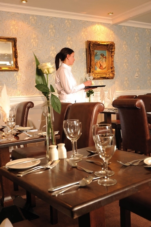 Imagen del bar/restaurante del Hotel Treacy's. Foto 4