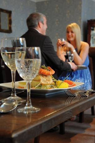 Imagen del bar/restaurante del Hotel Treacy's. Foto 6