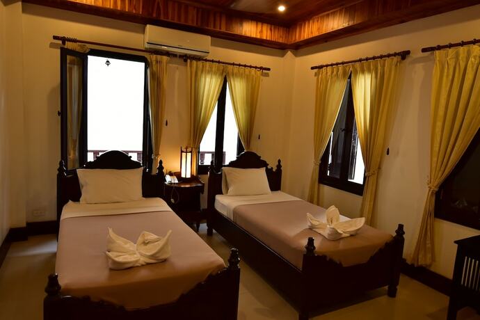 Imagen de la habitación del Hotel Treasure Laos. Foto 28